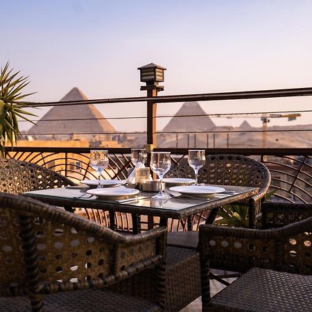 Pyramids Gem Plaza Hotel Kafrat al Jabal Bagian luar foto