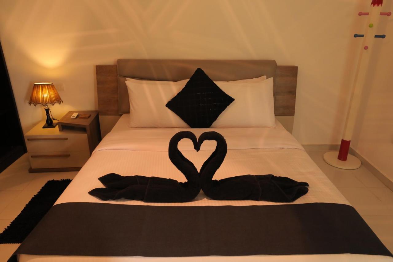 Pyramids Gem Plaza Hotel Kafrat al Jabal Bagian luar foto