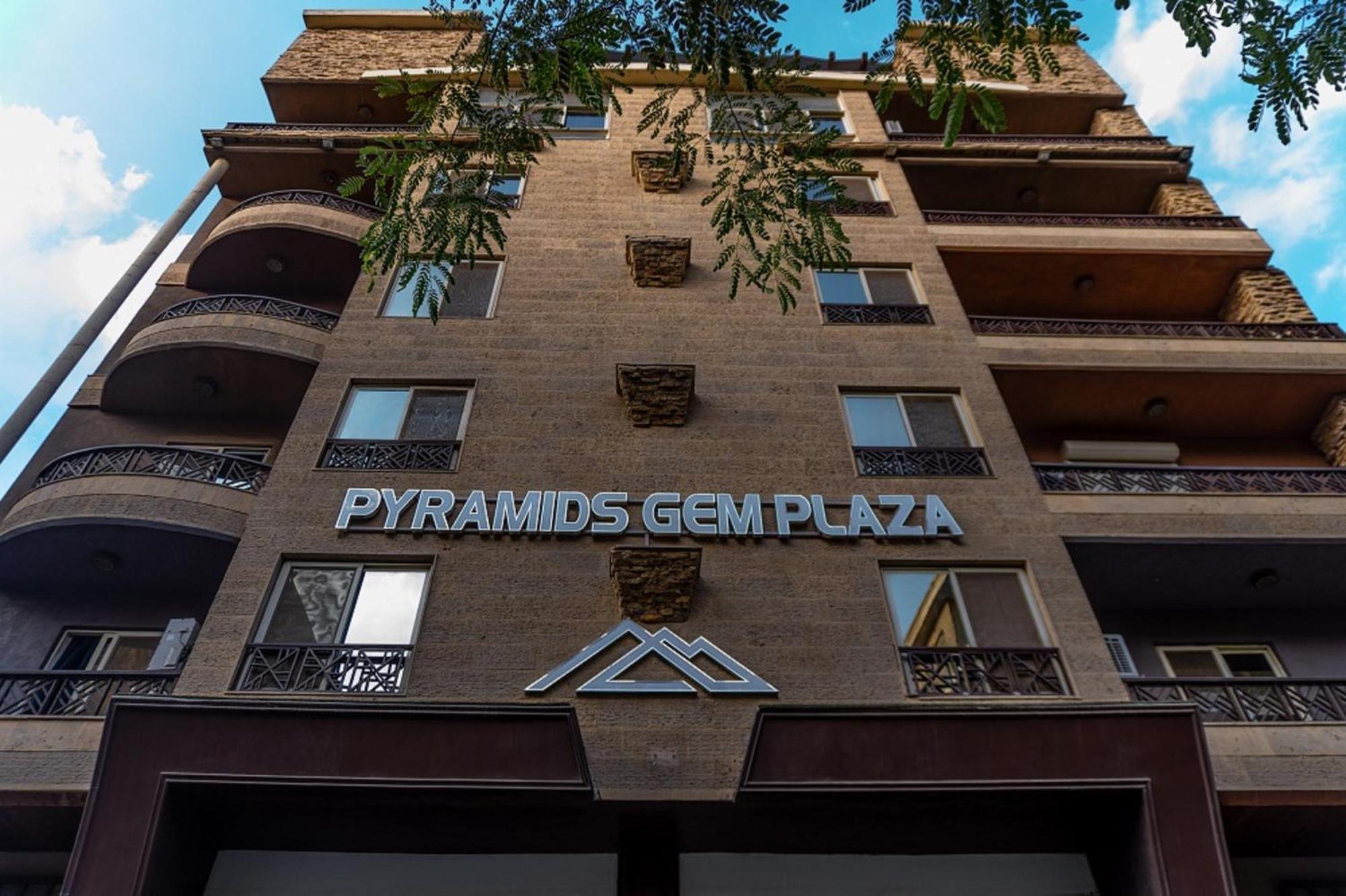 Pyramids Gem Plaza Hotel Kafrat al Jabal Bagian luar foto