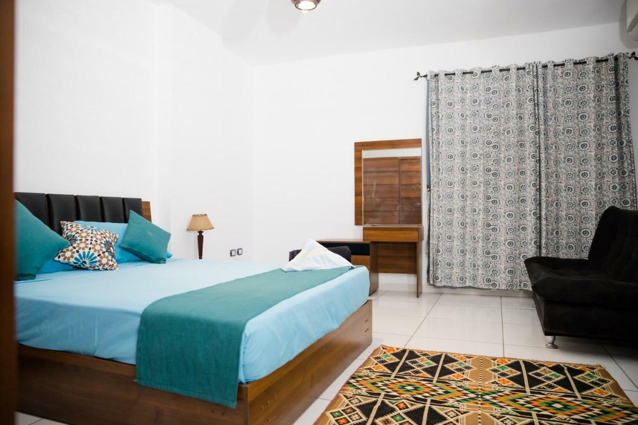 Pyramids Gem Plaza Hotel Kafrat al Jabal Bagian luar foto